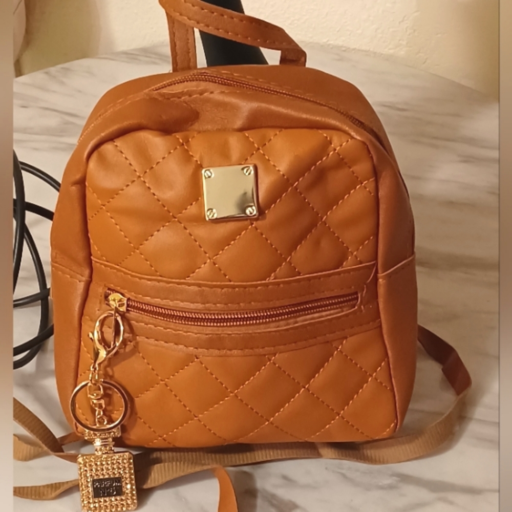 (Brown) Faux-leather Argyle quilted mini- backpack purse